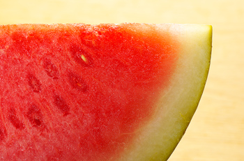 Juice of this fruit is excellent to reduce muscle soreness, if you drink it before a workout. What is it?
